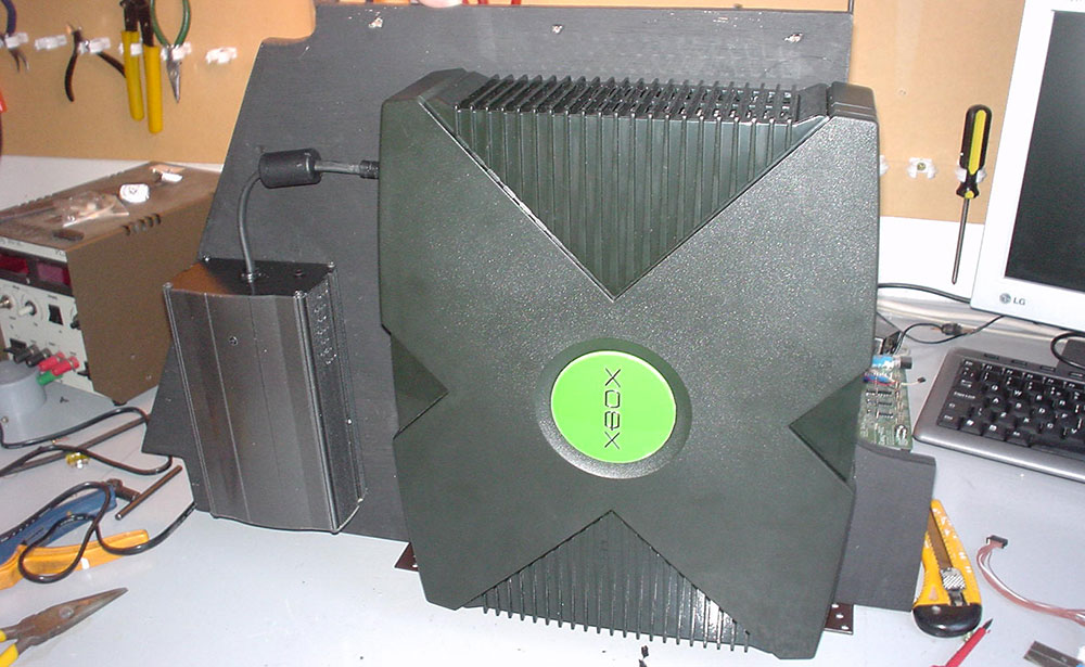 The Xbox and inverter ready to be installed