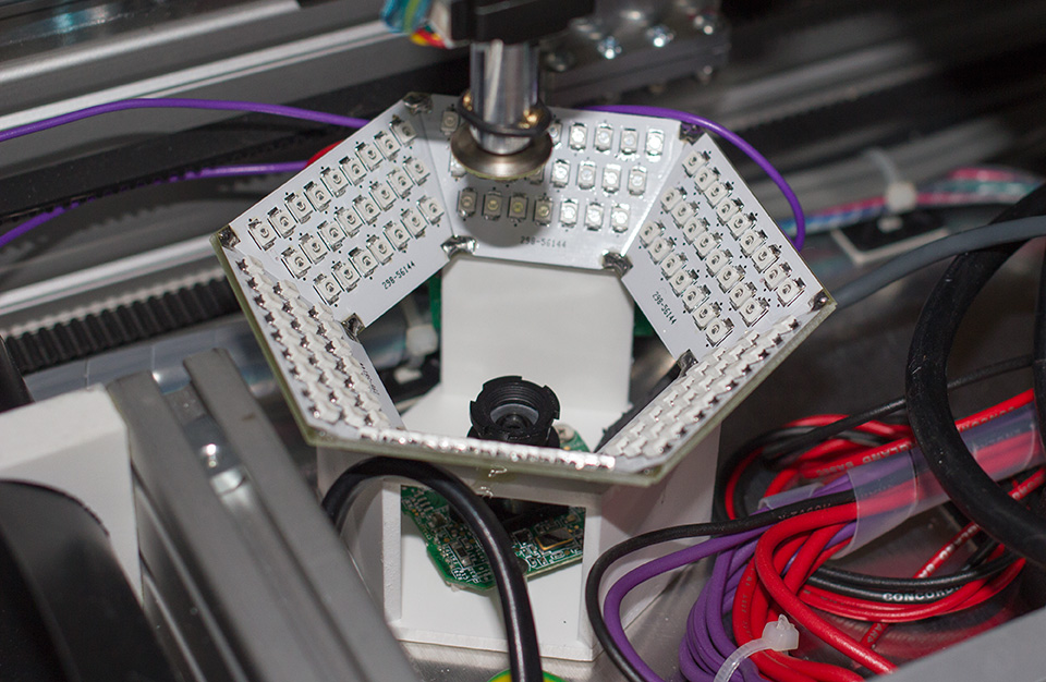 Picker head over the LED and Camera system