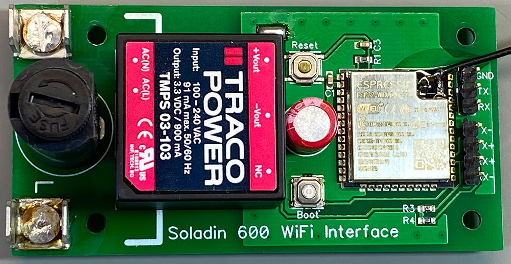 The completed PCB with power supply and fuseholder