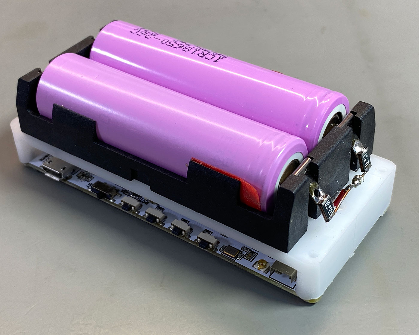 Battery holder fitted