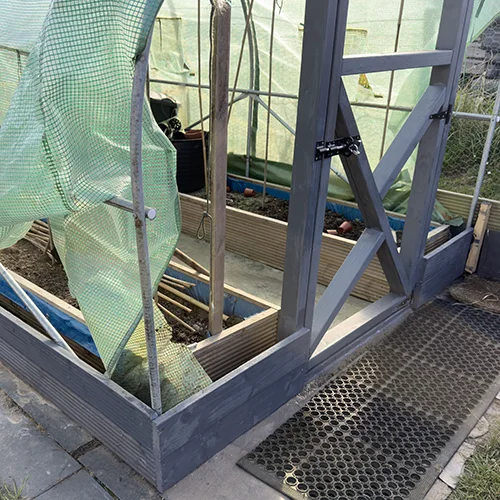 Door fitted with wood surround