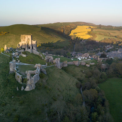 Sun setting over Corfe Castle, looking along the purbeck hills #173