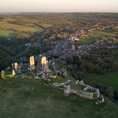 Sun setting over Corfe Castle, looking along the village #174