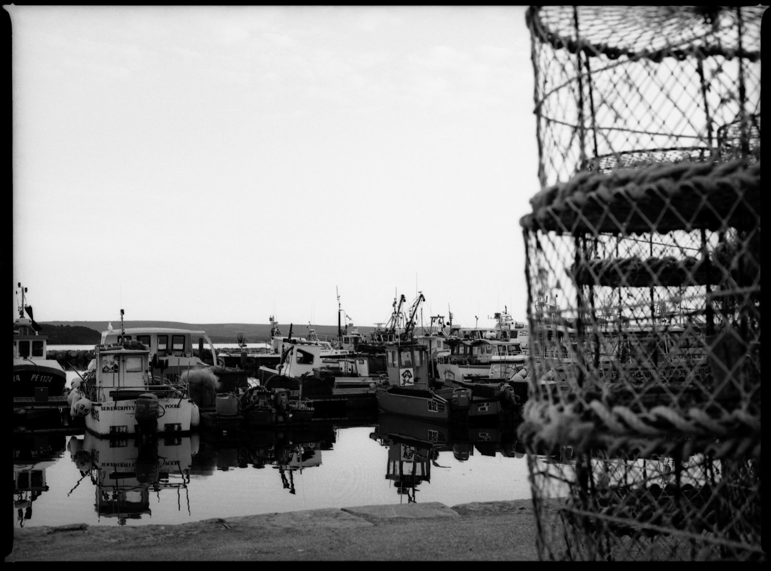 Photo of fishing boats and pots