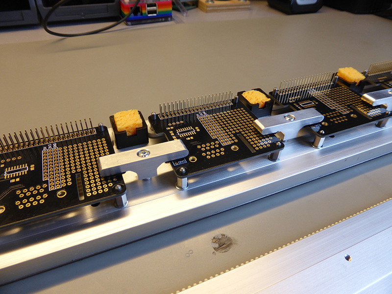Click to view large image of PCB Clamps and solder cleaning sponge